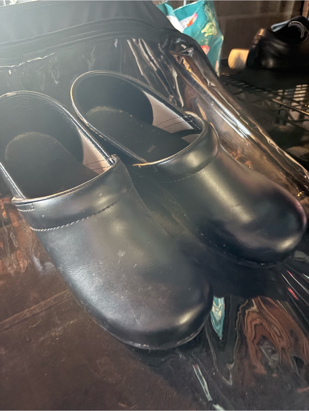 Dansko Black Leather Slip-On Clogs